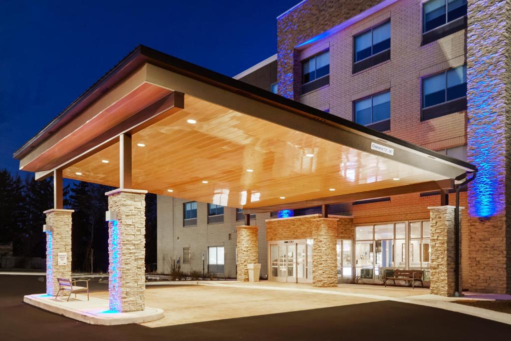 a building with awning in front of a building at Holiday Inn Express & Suites Chicago North Shore - Niles, an IHG Hotel in Niles