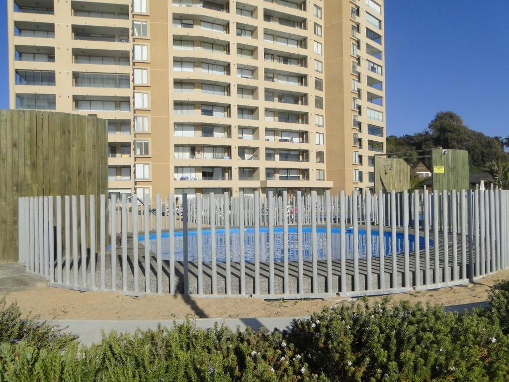 Bazén v ubytování Condominio Arena Maris nebo v jeho okolí
