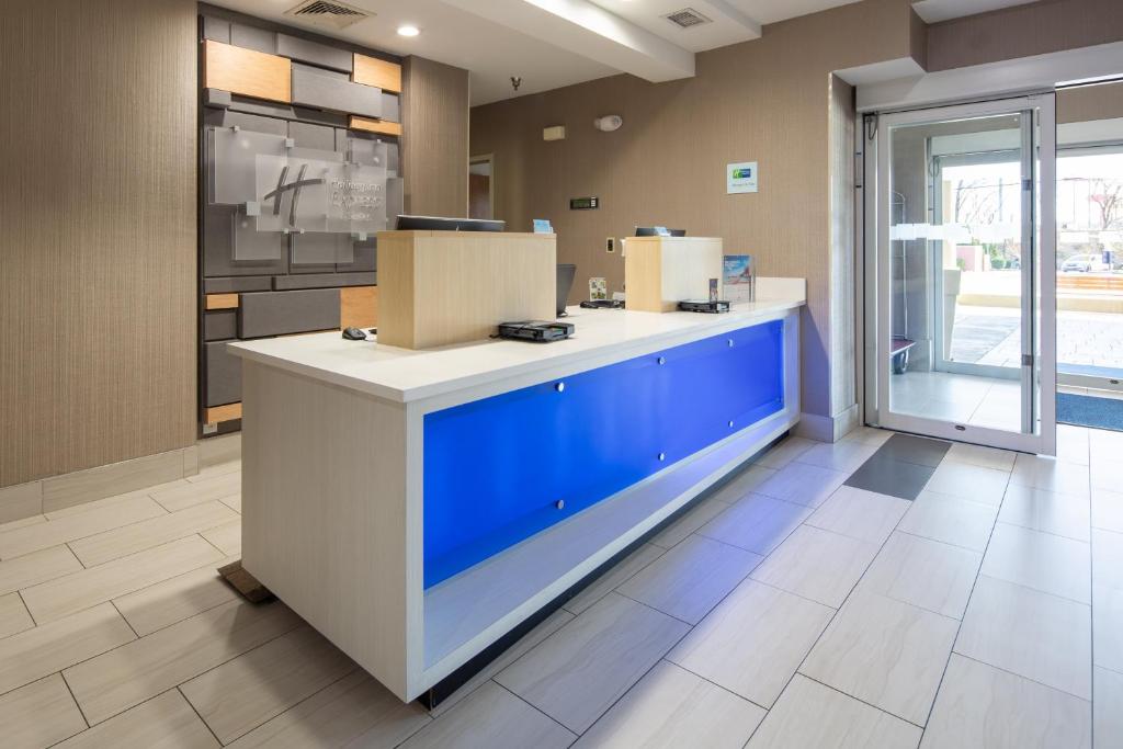 a kitchen with a blue island in a room at Holiday Inn Express & Suites Chattanooga - East Ridge by IHG in Chattanooga