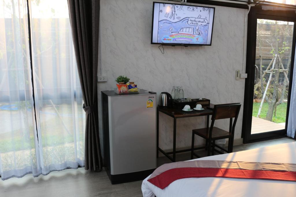 TV a/nebo společenská místnost v ubytování AKKARA RESORT&VILLA