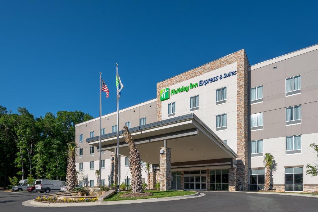a rendering of the front of a hotel at Holiday Inn Express & Suites - Charlotte Airport, an IHG Hotel in Charlotte