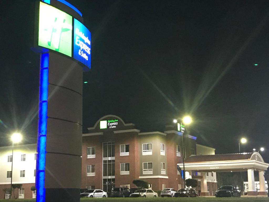 a sign in front of a hotel at night at Holiday Inn Express Hotel & Suites Canton, an IHG Hotel in Canton