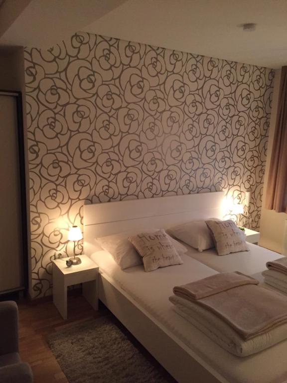 Postel nebo postele na pokoji v ubytování B&B Alex18