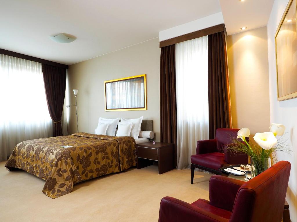 Krevet ili kreveti u jedinici u okviru objekta IN Hotel Beograd