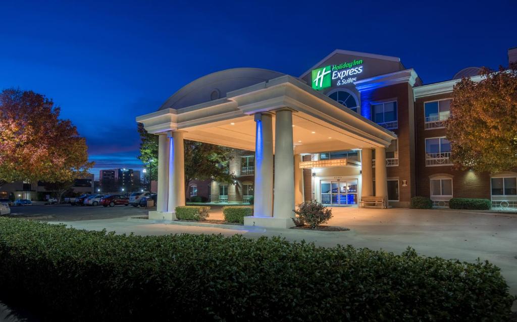 a hotel building with a gazebo in front of it at Holiday Inn Express Hotel & Suites Plano West - Frisco by IHG in Plano