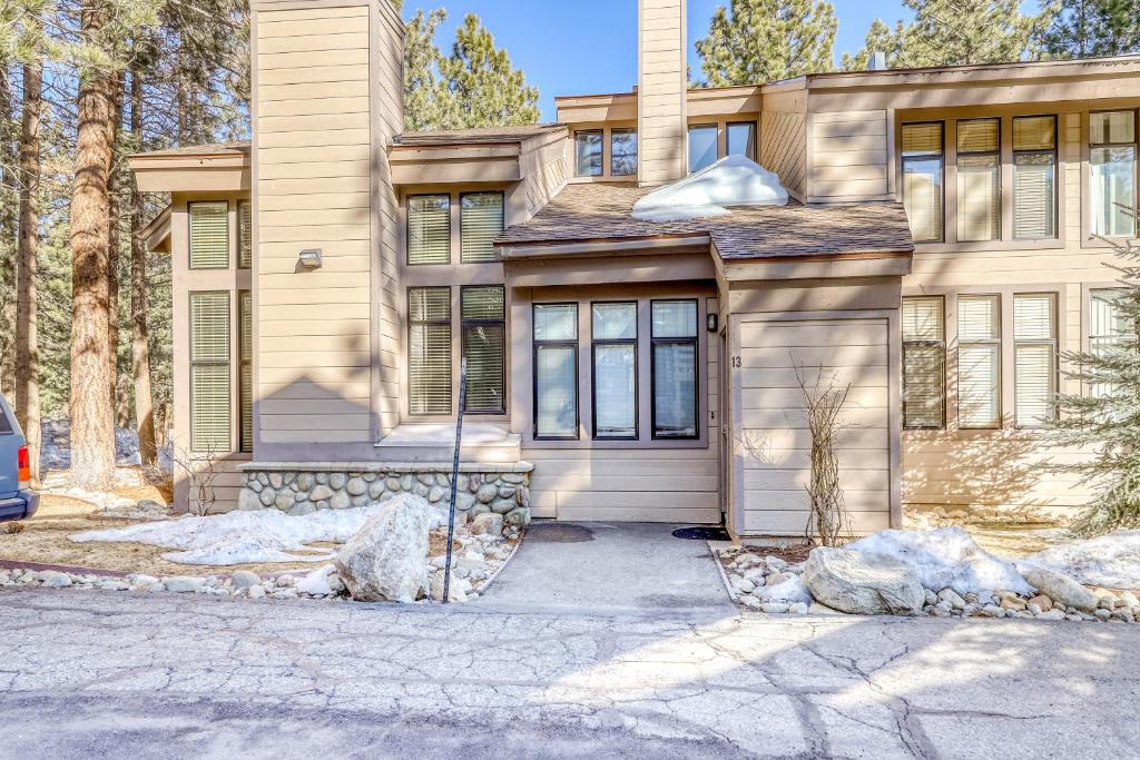 a house with a driveway in front of it at St. Moritz 13 in Mammoth Lakes