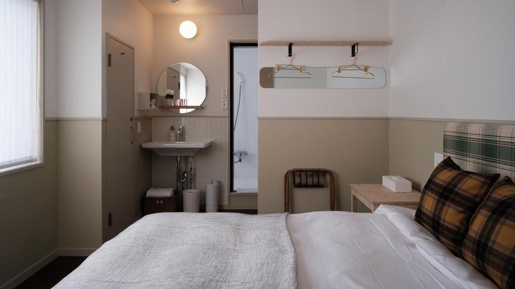 Postel nebo postele na pokoji v ubytování miss morgan hotel