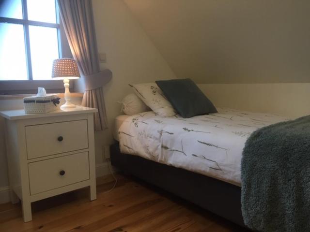 Postel nebo postele na pokoji v ubytování 't Ligt ter Velde, oase van rust, sauna, directie Brugge