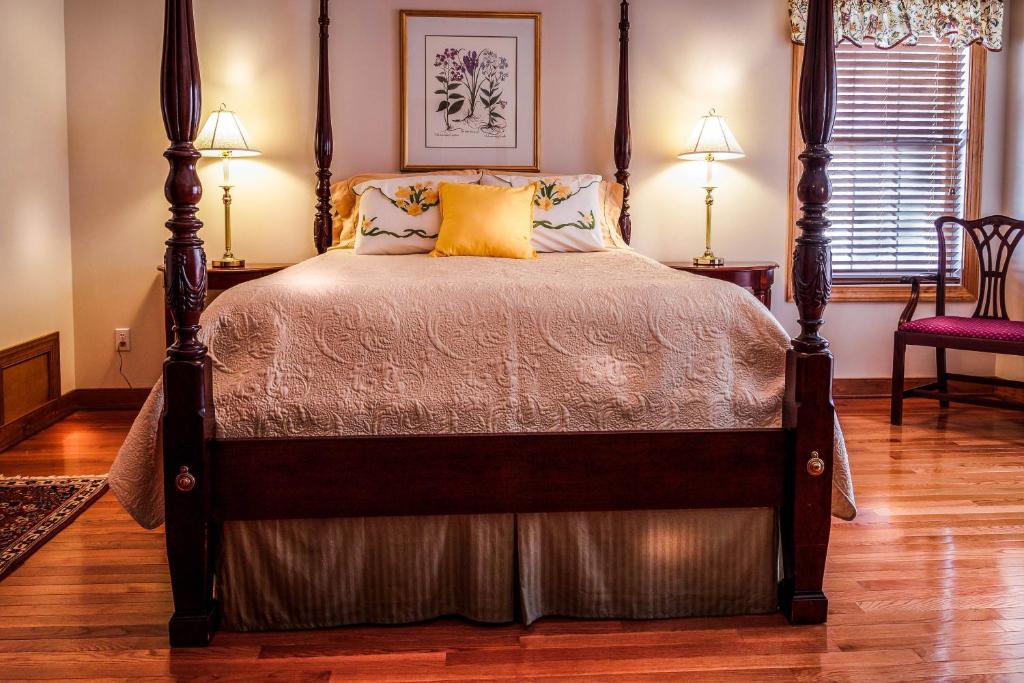 Un pat sau paturi într-o cameră la ambiente solutions apartments