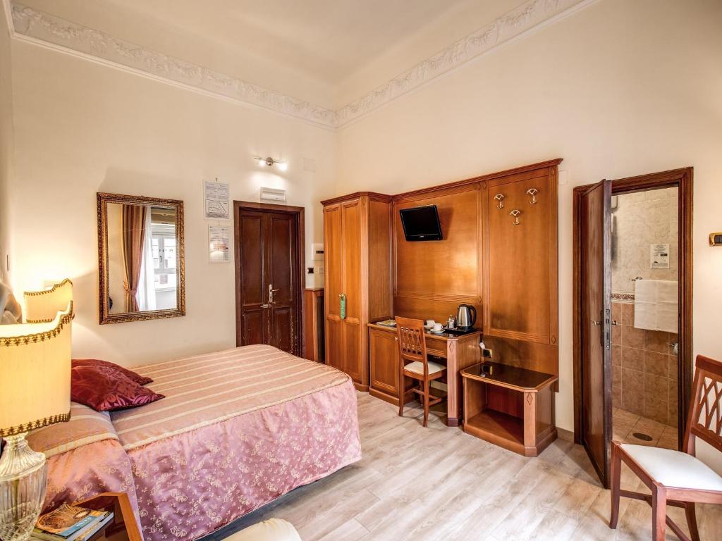 Voodi või voodid majutusasutuse Hotel Labelle toas