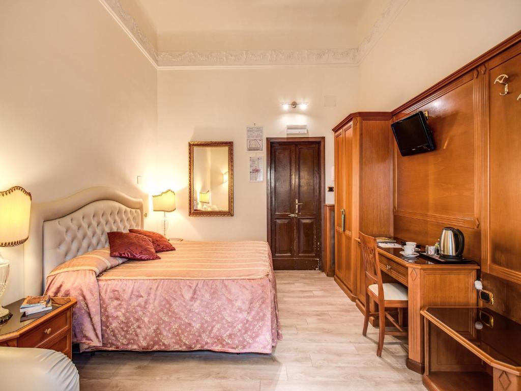 Voodi või voodid majutusasutuse Hotel Labelle toas