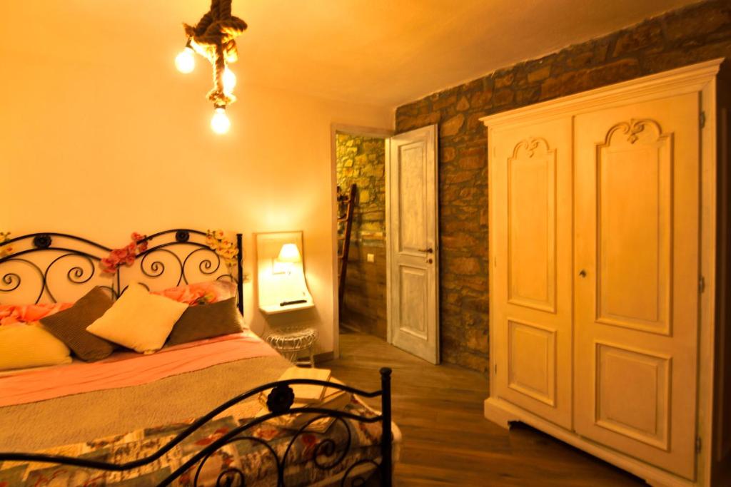 Postel nebo postele na pokoji v ubytování Il Borgo del Castello