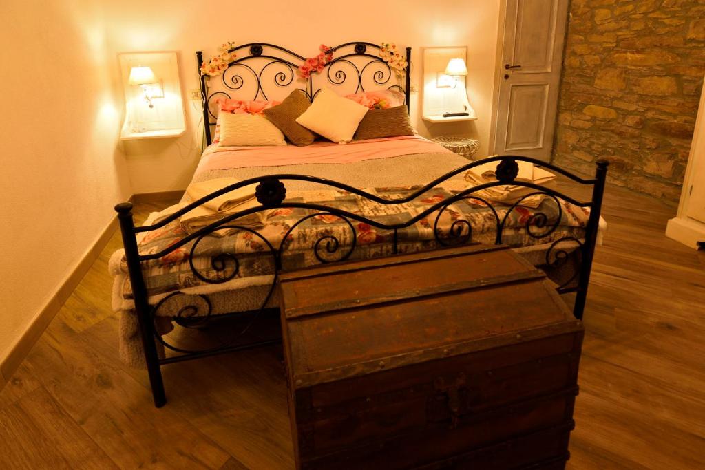 Postel nebo postele na pokoji v ubytování Il Borgo del Castello