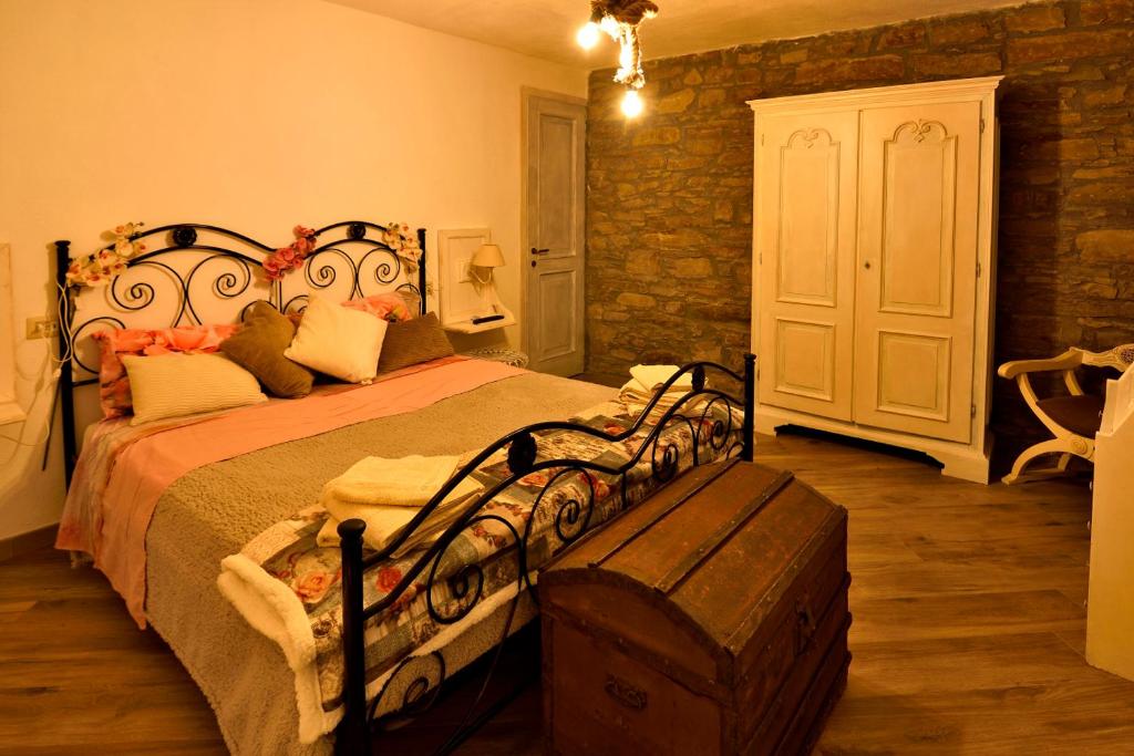 Postel nebo postele na pokoji v ubytování Il Borgo del Castello