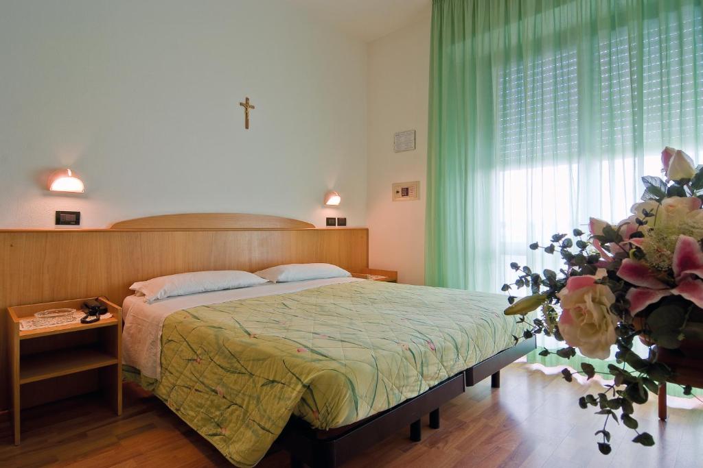Postel nebo postele na pokoji v ubytování Little Hotel