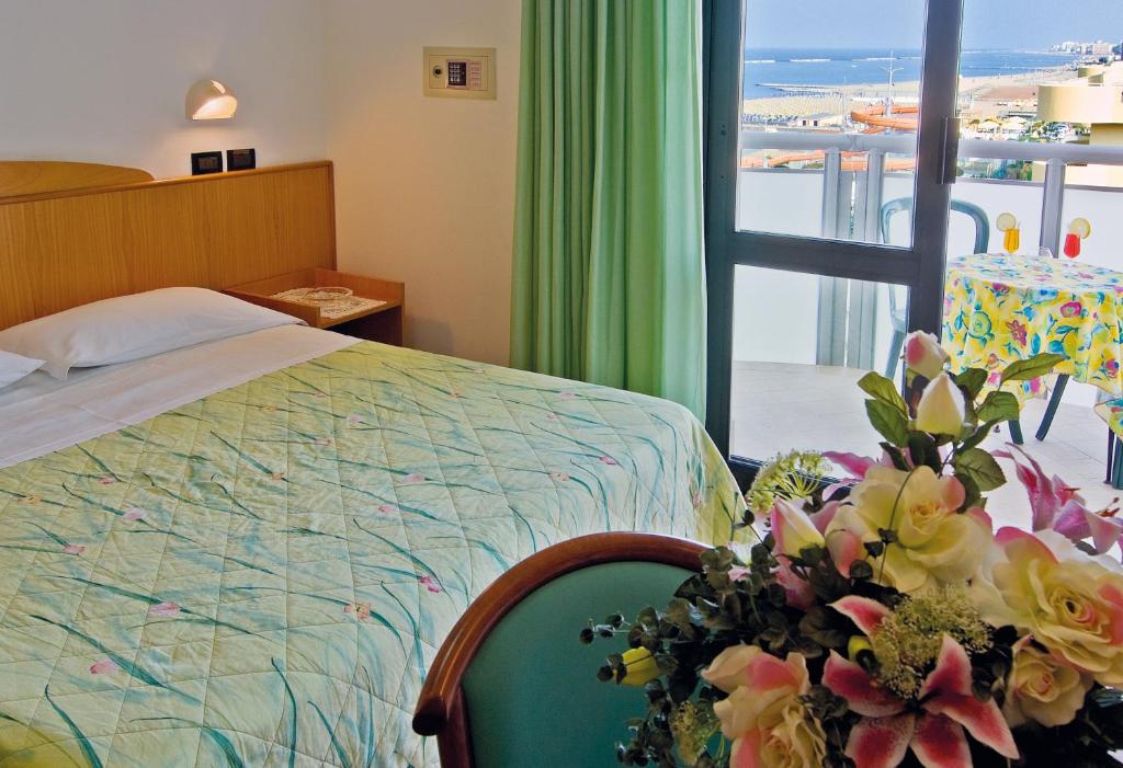 Postel nebo postele na pokoji v ubytování Little Hotel