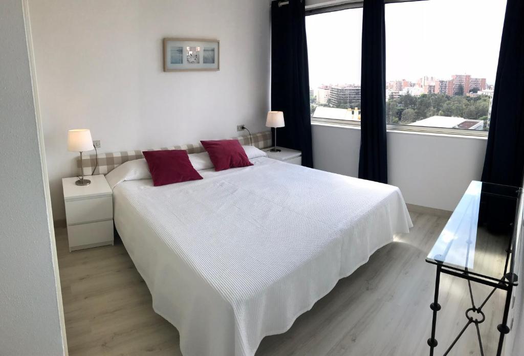 Postel nebo postele na pokoji v ubytování Apartamentos Bruja