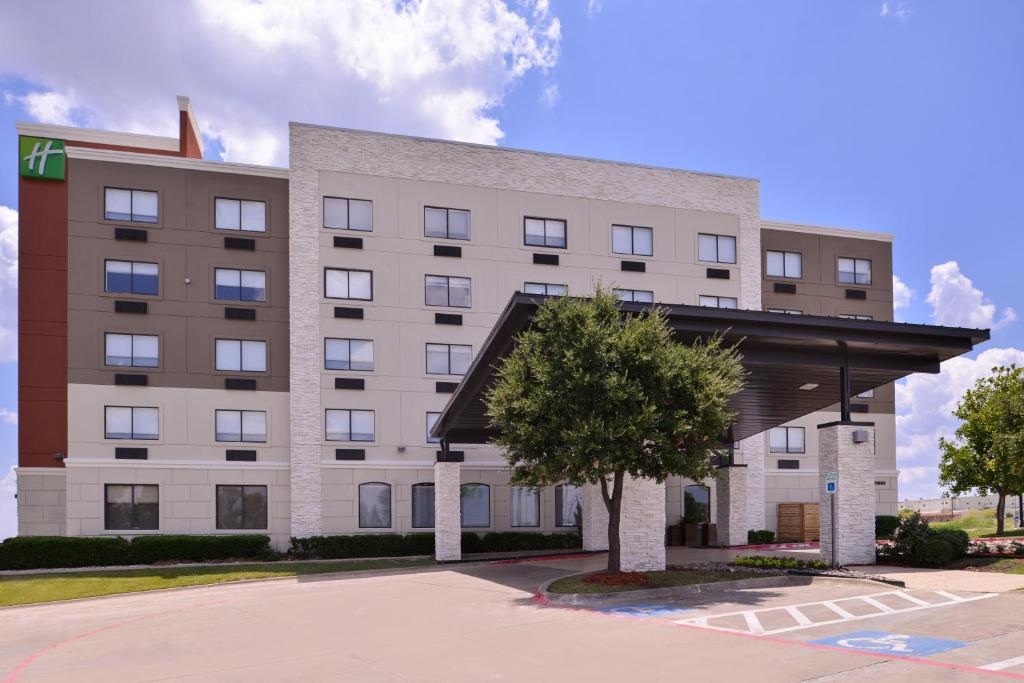 a rendering of the front of a hotel at Holiday Inn Express Hotel and Suites Mesquite, an IHG Hotel in Mesquite