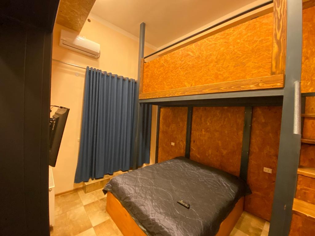 Postel nebo postele na pokoji v ubytování Mia B&B Old Tbilisi