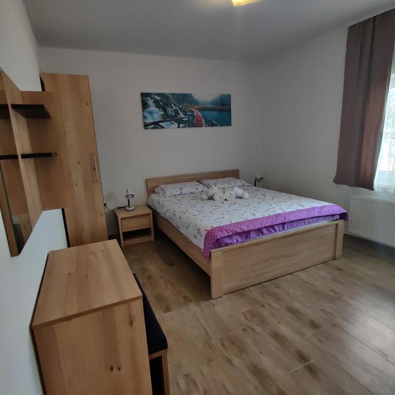 Posteľ alebo postele v izbe v ubytovaní Guest House Šapina