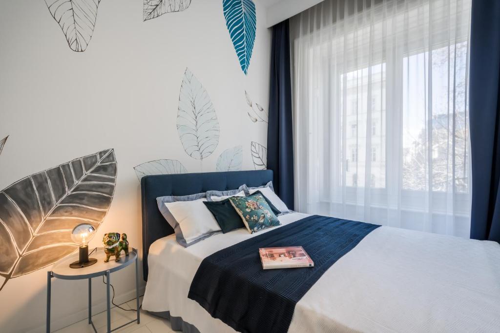 Posteľ alebo postele v izbe v ubytovaní BpR KYANIT Design Apartments with A/C