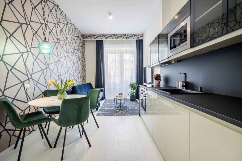 Kuchyňa alebo kuchynka v ubytovaní BpR KYANIT Design Apartments with A/C