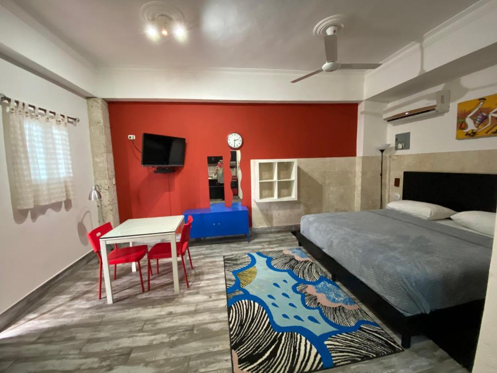 Postel nebo postele na pokoji v ubytování Apartahotel Guaraguao