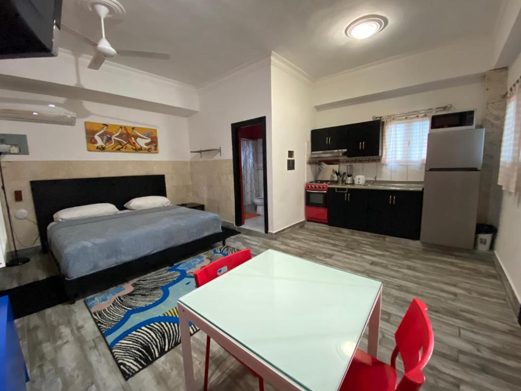 Kuchyň nebo kuchyňský kout v ubytování Apartahotel Guaraguao