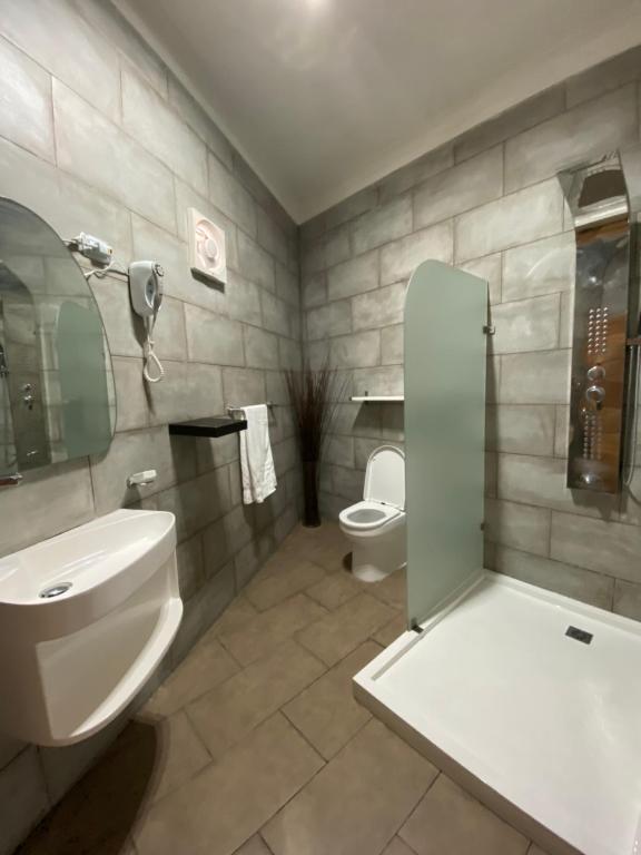 Koupelna v ubytování Apartahotel Guaraguao