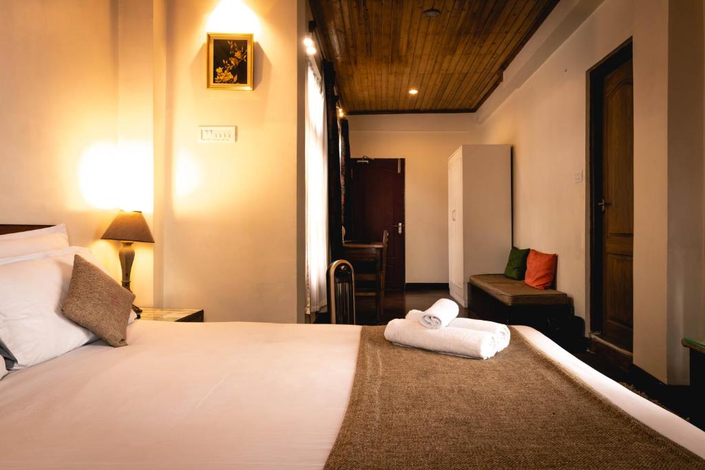Postel nebo postele na pokoji v ubytování Villa Everest
