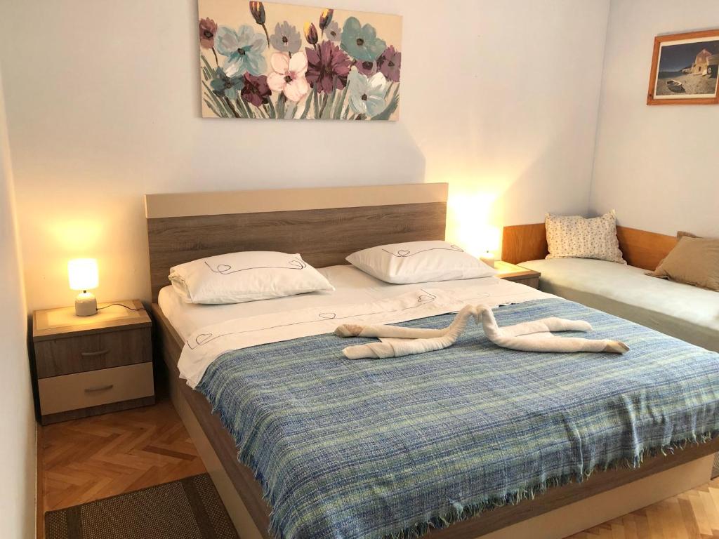 Postel nebo postele na pokoji v ubytování Apartment Ciba
