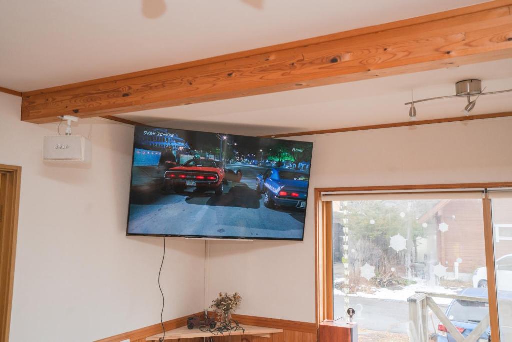 TV a/nebo společenská místnost v ubytování Guest House Chaconne Karuizawa