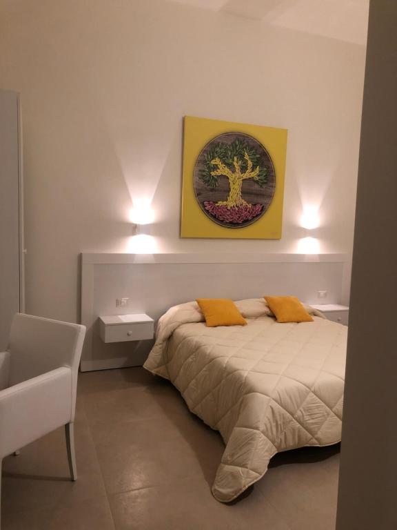 Postel nebo postele na pokoji v ubytování PalÈat-Manduria