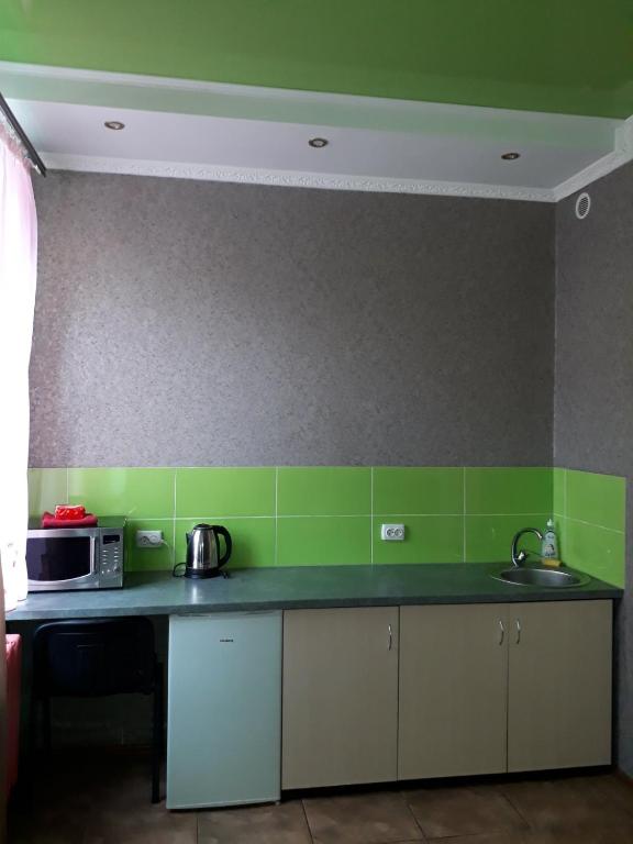 Kuchyň nebo kuchyňský kout v ubytování Hotel UNENEGE