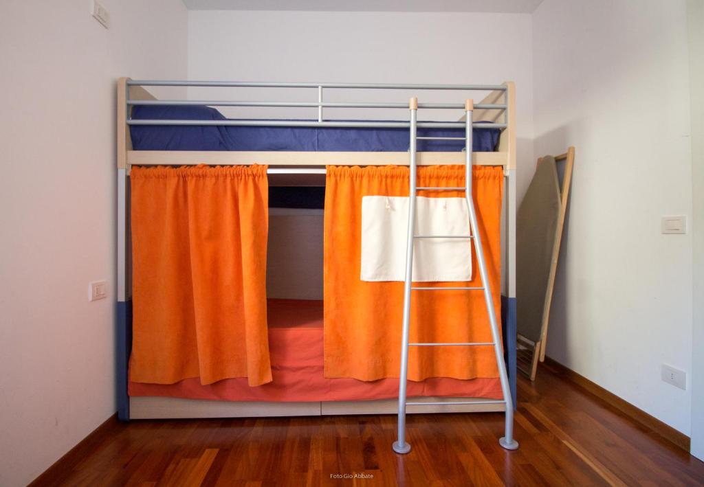 Postel nebo postele na pokoji v ubytování Appartamento La Vigna