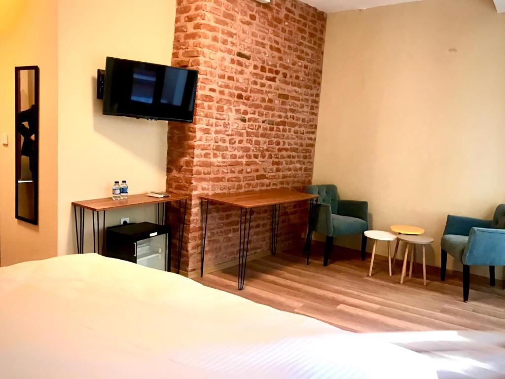 TV a/nebo společenská místnost v ubytování Maravilloso Hotel Pera