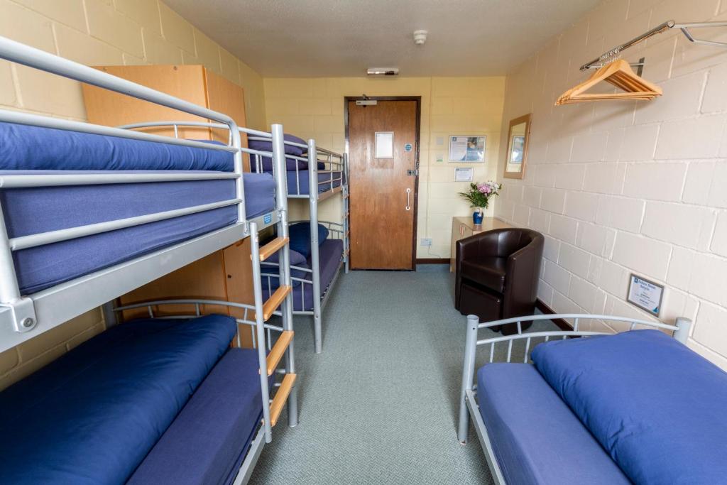 Postel nebo postele na pokoji v ubytování Torridon Youth Hostel