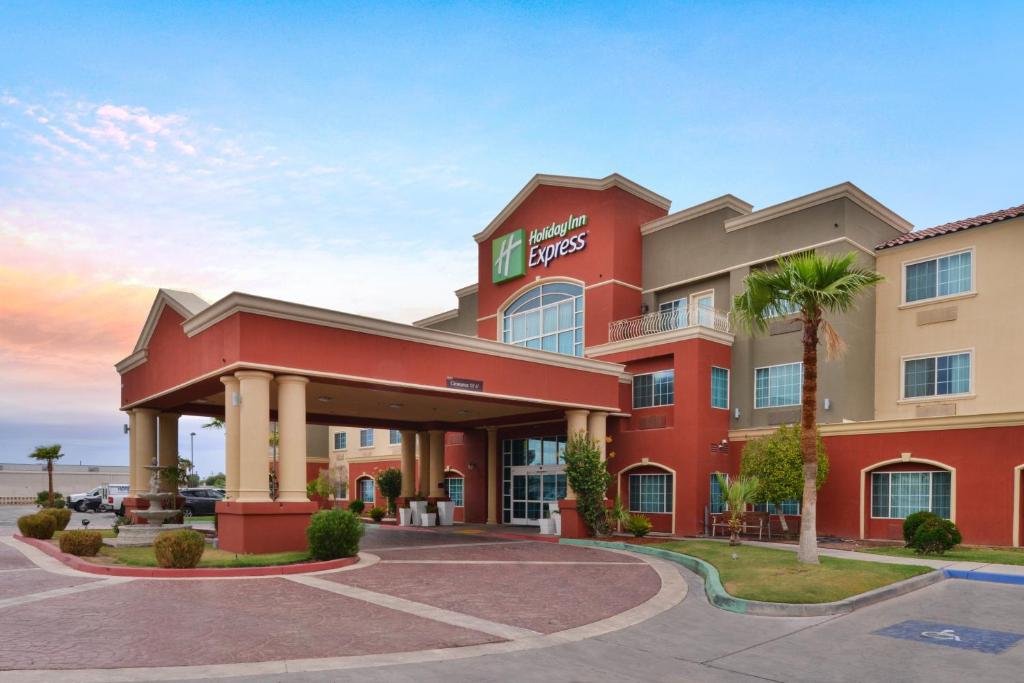 a front view of a hotel with a parking lot at Holiday Inn Express Hotel & Suites El Centro, an IHG Hotel in El Centro