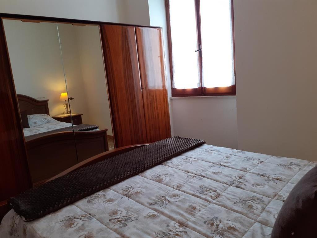 Postel nebo postele na pokoji v ubytování Casa Ombrina