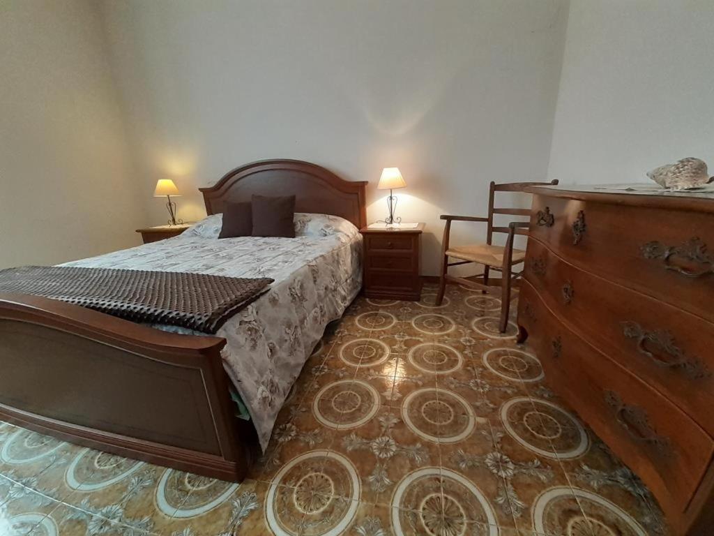 Postel nebo postele na pokoji v ubytování Casa Ombrina