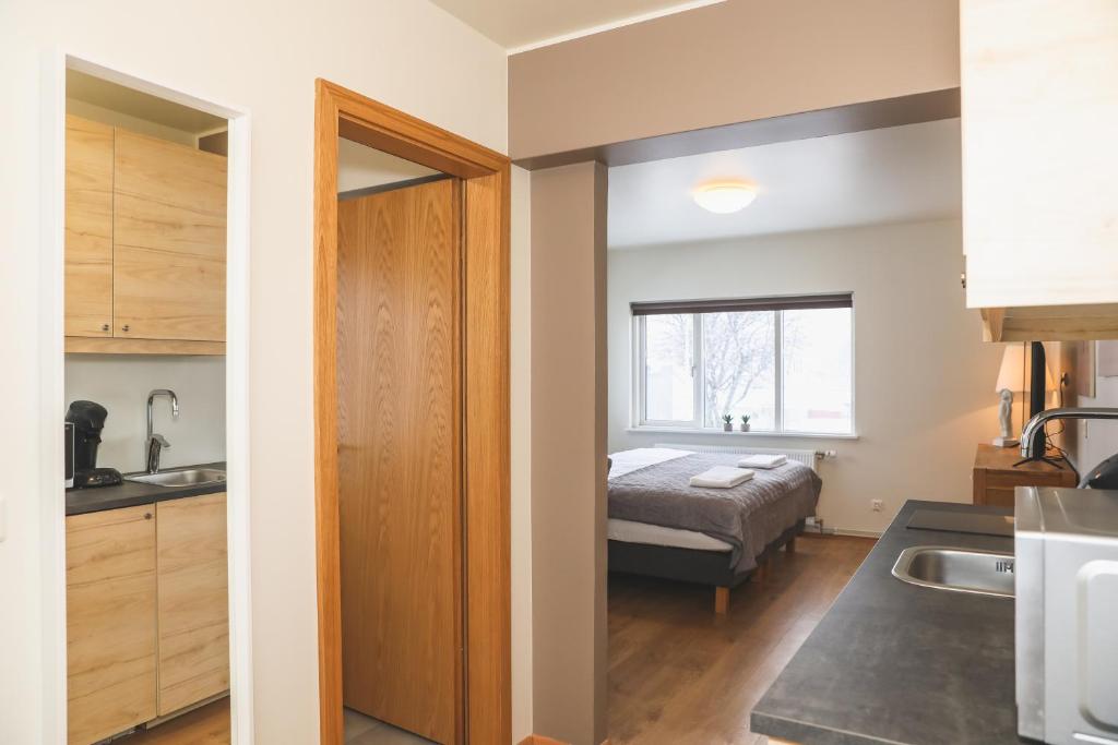 E18 Apartments - Estudio Estándar