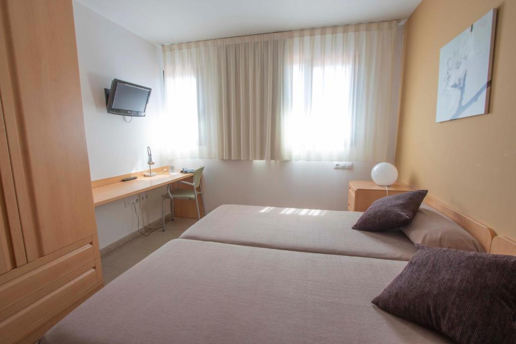 Villa Alojamiento y Congresos - Villa Universitaria - Quadruple Room