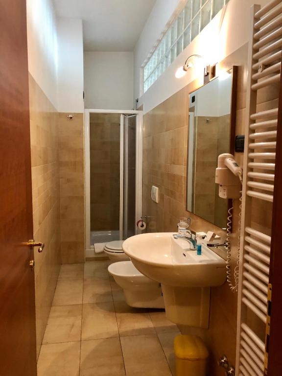 Koupelna v ubytování Mingone Hotel Ristorante
