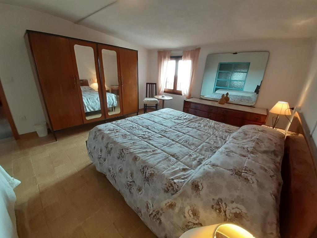 Postel nebo postele na pokoji v ubytování Casa Ombrina