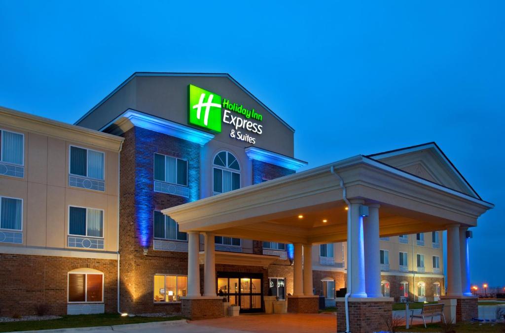 a hotel with a sign on the front of a building at Holiday Inn Express Hotel & Suites Mattoon, an IHG Hotel in Mattoon