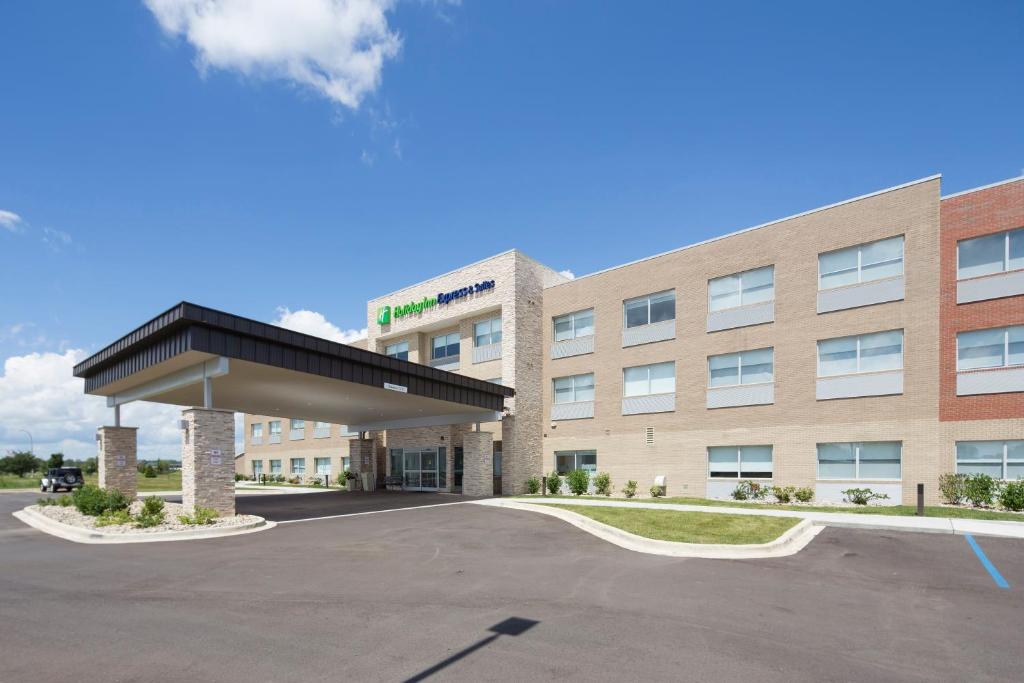 an image of a hotel with a gas station at Holiday Inn Express & Suites - Gaylord, an IHG Hotel in Gaylord