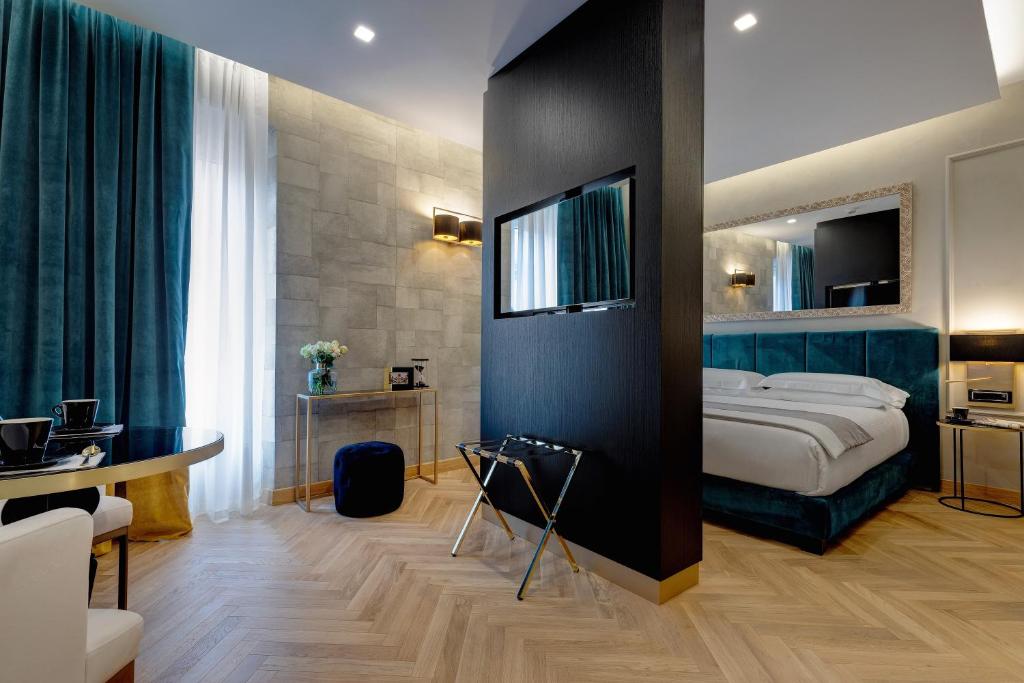A bed or beds in a room at Dharma Boutique Hotel & SPA