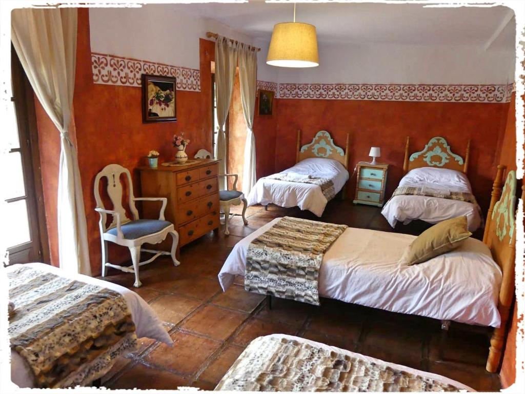 Posteľ alebo postele v izbe v ubytovaní Cortijo Casas Viejas
