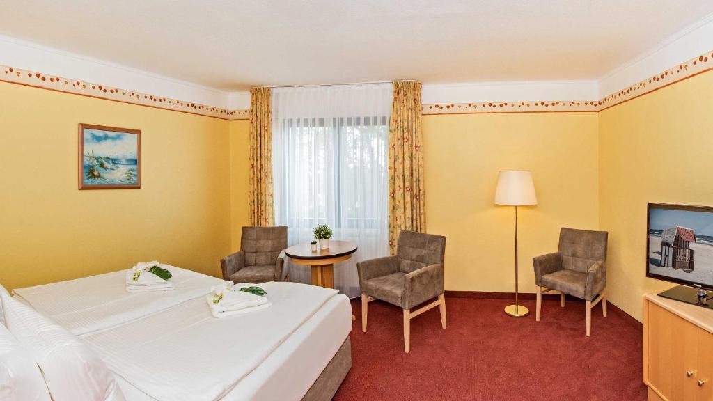 TV a/nebo společenská místnost v ubytování Hotel Garni Nussbaumhof