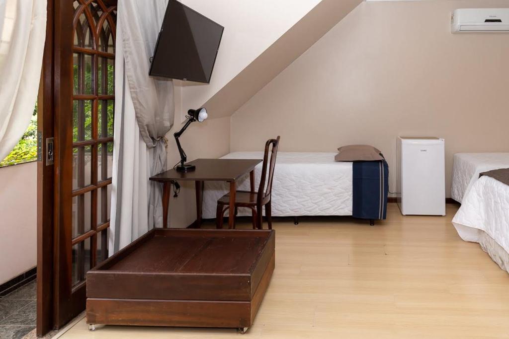  Pousada Casa da Pedra